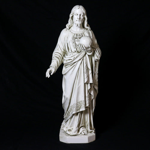 Jesus statue in classical Renaissance style, featuring ornate drapery and detailed facial features, holding a globe in one hand. Different Angle