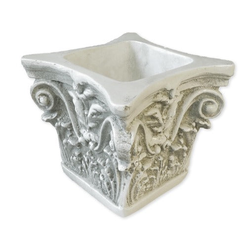 Ornate square planter with classical Baroque scrollwork, acanthus leaf motifs, and old world European architectural detailing.