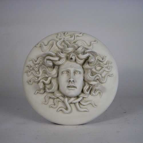 Medusa head relief with intricate serpentine hair, classical Greek style, ornate detailing, and dramatic facial expression. Side Angle