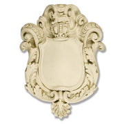 Ornate old world European shield plaque with Baroque scrollwork, acanthus leaf details, and a classical crown crest at the top.