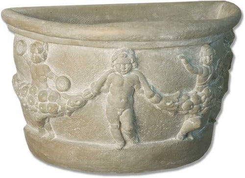Ornate old world European planter with classical relief of cherubs in a garland, featuring Baroque and Renaissance detailing.