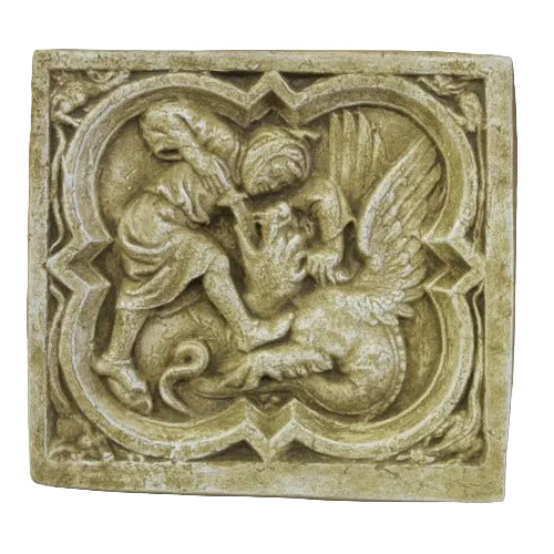 Medieval-style relief plaque depicting a winged dragon and a robed figure in ornate, old world European architectural framing. Side View