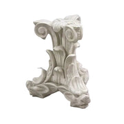 Ornate old world European corbel with classical acanthus leaf motifs and intricate Baroque scrollwork detailing.