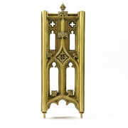 Gothic-style ornate panel with pointed arches, quatrefoil cutouts, and intricate classical detailing reminiscent of medieval architecture. Side View