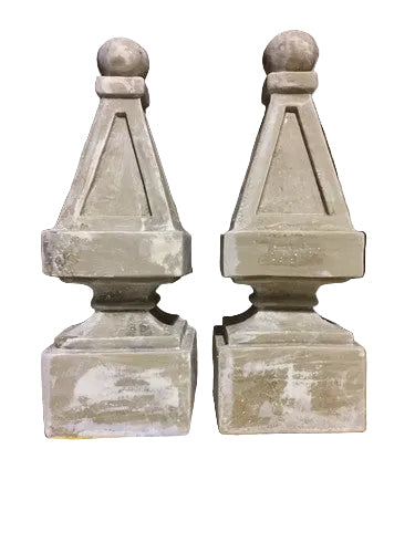 Pair of old world European finials with classical pyramid shapes, ornate detailing, and ball tops on square bases.