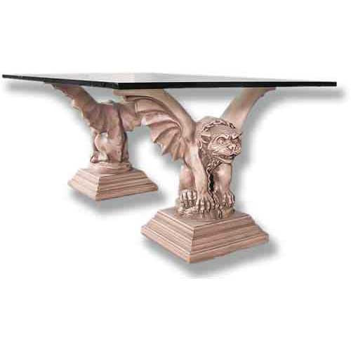Gothic-style table with ornate gargoyle bases and a rectangular top, featuring medieval and old world European detailing.