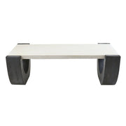 Rectangular coffee table with classical minimalist design, featuring thick, curved legs and a clean, architectural silhouette.
