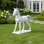 Standing horse statue with classical European style, detailed mane and tail, poised on a rectangular base with subtle ornate accents. Side Angle