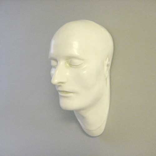 Classical European sculpted head with closed eyes, smooth features, and serene expression, evoking Renaissance and old world style. Different Angle
