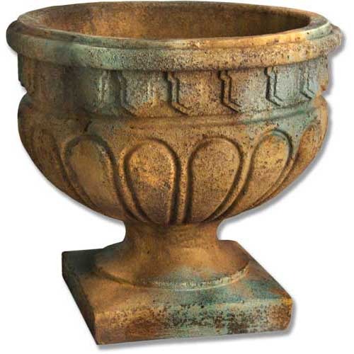Ornate old world European urn planter with classical fluted detailing and a pedestal base, featuring a weathered, antique finish.