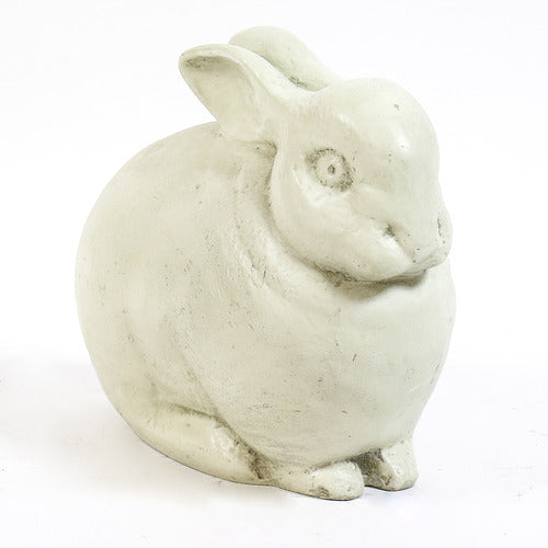 Sculpted rabbit figurine with rounded form and subtle detailing, inspired by old world European and classical garden statuary. Side View