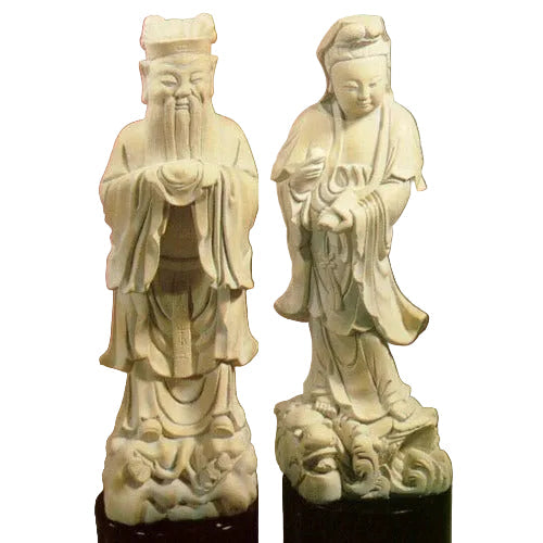 Pair of ornate, classical Asian figurines with intricate robes and serene expressions, featuring traditional old world detailing.