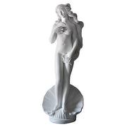 Venus standing on a scallop shell in a classical Renaissance style, with flowing hair and ornate, old world European detailing.