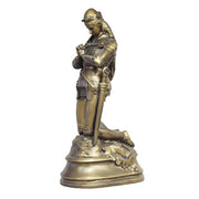 Kneeling medieval knight in ornate armor, hands clasped in prayer, classical old world European style with Gothic detailing. Side View