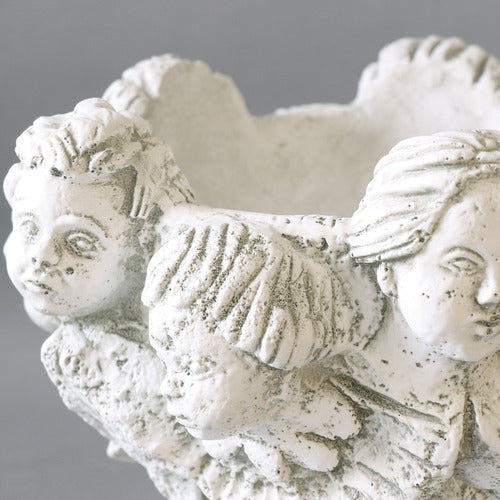Faces of Cherub pot (10-Inch)