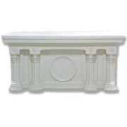 Classical altar table with ornate fluted columns, round medallions, and Renaissance-inspired architectural detailing.