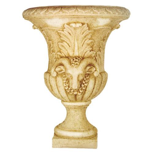 Ornate classical urn with Baroque detailing, featuring a sculpted ram’s head and acanthus leaf motifs in old world European style.