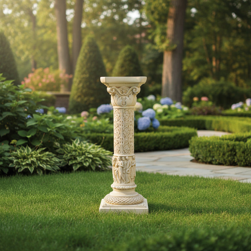 Classical Greek column pedestal with ornate carvings, fluted shaft, and decorative capital in old world European style. Side Angle