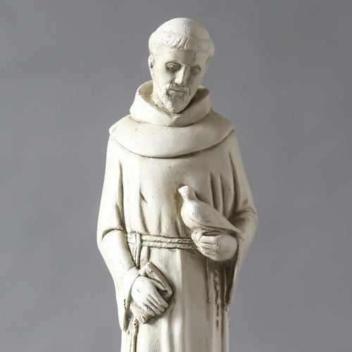 Saintly monk statue in old world European style, holding a bird with an ornate, classical design and a crane at his feet. Other Angle