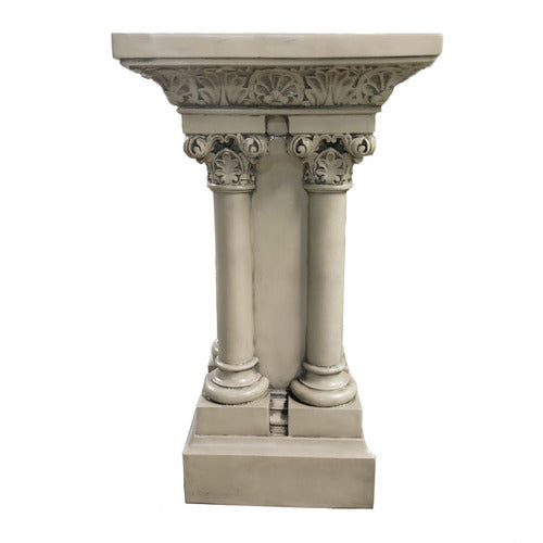 Classical pedestal with ornate Corinthian columns and intricate old world European detailing in a Renaissance architectural style. Side View