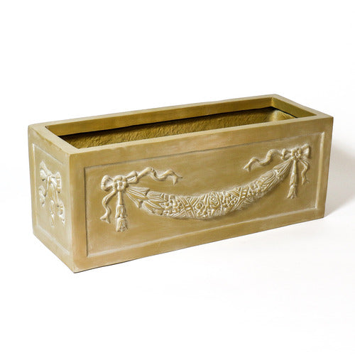 Rectangular planter box with ornate Baroque-style garland and ribbon relief, featuring classical old world European detailing. Side View