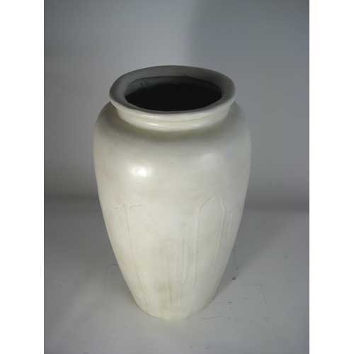 Tall classical urn with smooth, rounded silhouette and subtle old world European detailing in a minimalist, timeless style. Side Angle