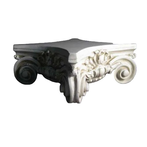 Ornate classical corner capital with intricate Baroque scrollwork and acanthus leaf detailing in old world European style. Side View