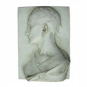 Classical bas-relief plaque featuring a woman in profile with an elegant updo, inspired by Renaissance and old world European style.