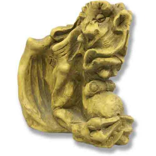 Grotesque face wall decor with exaggerated features, curled wings, and ornate old world European Gothic style detailing.