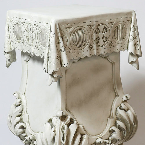 Ornate Baroque-style pulpit with intricate carvings, classical motifs, and a decorative lace cloth draped over the top. Different Angle
