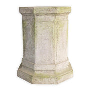 Octagonal pedestal with classical old world European design, featuring paneled sides and subtle ornate detailing with a weathered finish.
