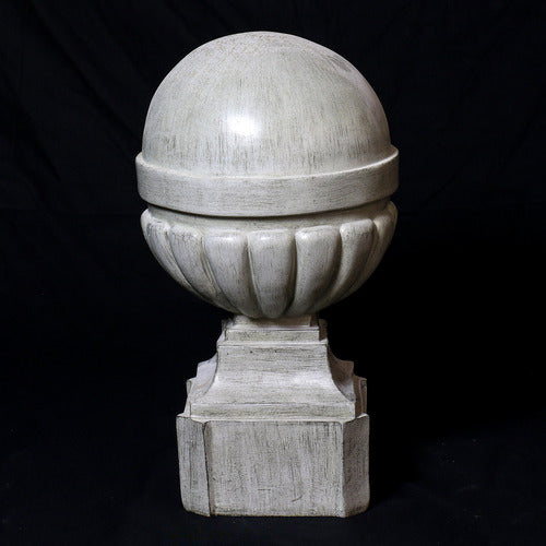 Ornate old world European finials with classical rounded tops and fluted bases, displayed in three graduated sizes on square pedestals. Different Angle