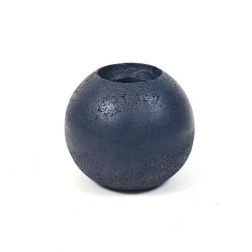 Round, textured vase with a minimalist, old world European design and subtle, weathered surface reminiscent of classical pottery.