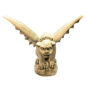 Gothic gargoyle statue with outstretched wings, fierce expression, and ornate chain detail in medieval European style. Side View