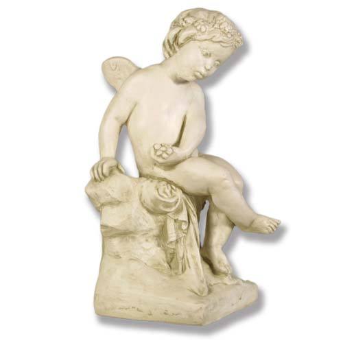 Cherub statue in classical Renaissance style, seated on a draped pedestal with ornate detailing and delicate facial features.