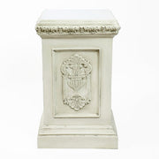 Classical European statue of a robed woman on an ornate pedestal with Renaissance and Baroque decorative reliefs. Other Angle