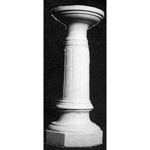 Classical pedestal with fluted column, ornate base, and round top in old world European architectural style.
