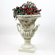 Ornate urn planter with classical Baroque detailing, acanthus leaf motifs, and scroll handles on a pedestal base. Side Angle