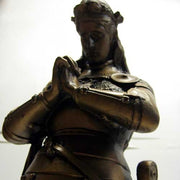 Kneeling medieval knight in ornate armor, hands clasped in prayer, classical old world European style with Gothic detailing. Additional Angle