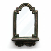 Arched mirror with ornate old world European frame and classical detailing, featuring a decorative Baroque-inspired shelf base.
