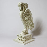 Winged griffin statue with ornate detailing, classical old world European style, featuring intricate Baroque and Renaissance motifs. Other Angle