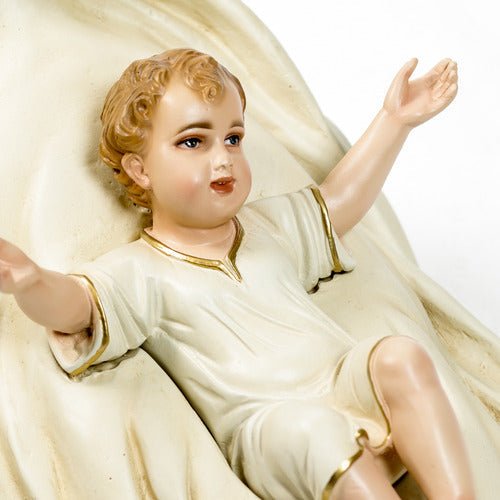 Baby Jesus in Manger Statue (9 - Inch) Side Angle View