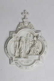 Baroque-style wall plaques depicting religious scenes in a Gothic church interior with vaulted ceilings and stained glass window. Different Angle
