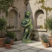 Cherub Holding Fruit Outdoor Statue (24 - Inch) Side Angle