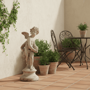 Standing Cherub Holding A Shell On A Round Base. Outdoor Statue (24 - Inch) Side Angle