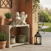 Two Sitting Winged Cherubs Holding Bowl Outdoor Statue (9 - Inch) Side Angle
